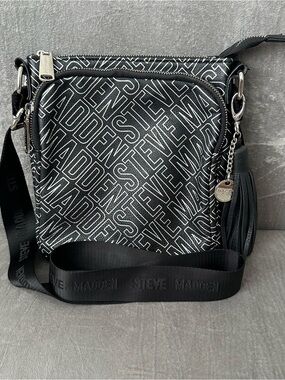 Steve Madden Textured Black Logo Crossbody Bag With Tassel Charm